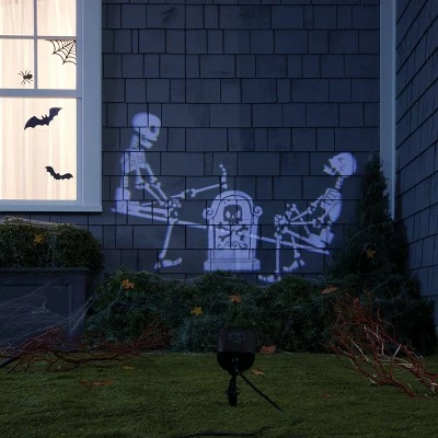 Hyde & EEK! Boutique LED Seesaw Skeleton Halloween Lightshow Projection - Hyde & EEK! Boutique™ 3 Hyde & EEK! Boutique LED Seesaw Skeleton Halloween Lightshow Projection - Hyde & EEK! Boutique™